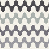 Detail of wallpaper in a playful curving stripe print in shades of blue and gray on a white field.