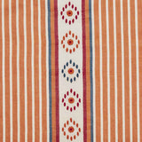 Detail of fabric in a global stripe print in shades of orange, blue and red on a cream field.