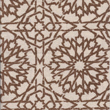 Detail of fabric in a small-scale lattice print in brown on a cream field.