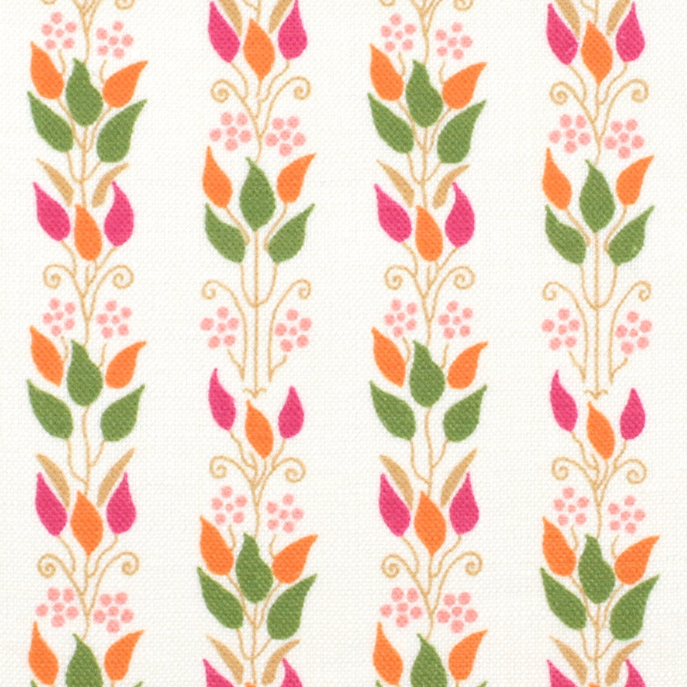 Detail of fabric in a striped botanical print in shades of pink, orange and green on a white field.