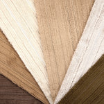 Array of froadloom carpet samples with ribbed and cut pile stripe in neutral colors from brown to ivory.