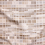 Close up of gently draped woven Indoor-Outdoor fabric with complex windowpane pattern in white with squares of taupe, beige, tan and cream.
