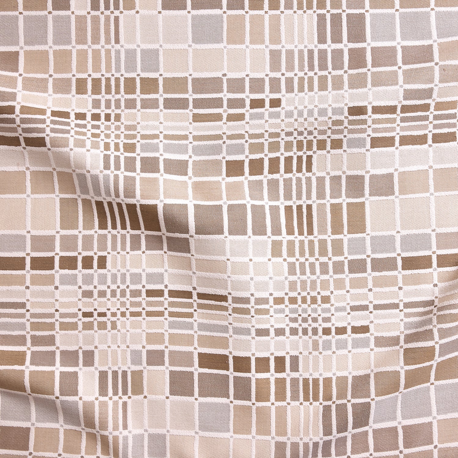 Close up of gently draped woven Indoor-Outdoor fabric with complex windowpane pattern in white with squares of taupe, beige, tan and cream.