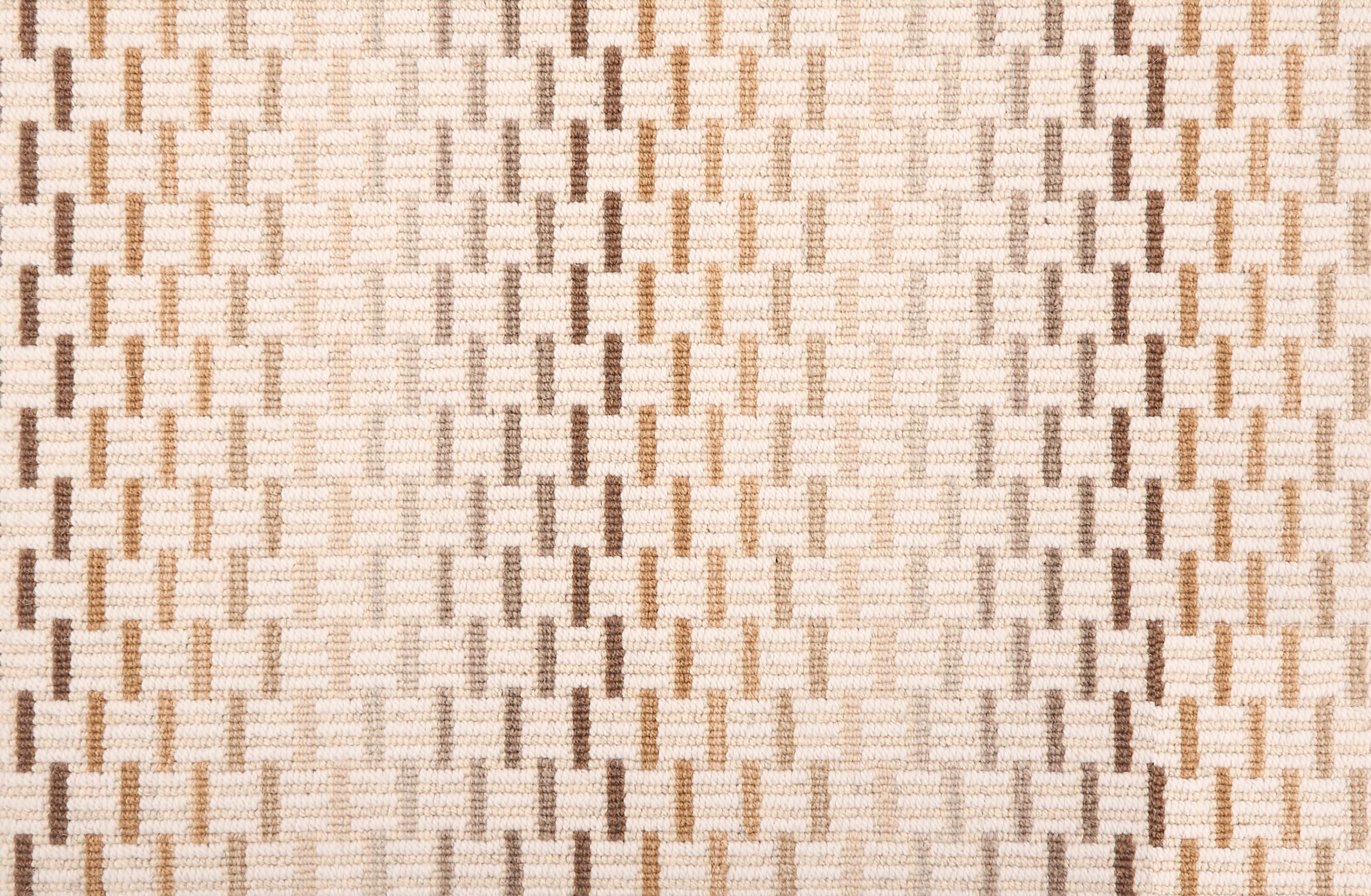 Broadloom carpet in a small ombré striped check in shades of brown, taupe and beige on a cream field.