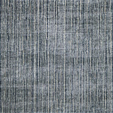 Broadloom carpet in subtle textural weave in blue. 