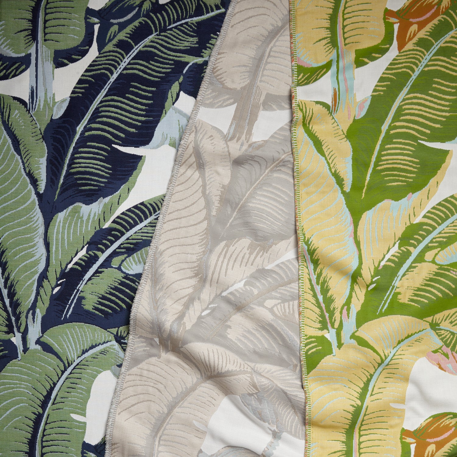 Gently draped fabric cuttings in a vintage banana leaf print in various colors.