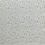 Fabric in a minimal floral print in navy and olive on a gray field.