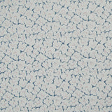 Fabric in a minimal floral print in pink and navy on a gray field.
