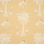 Detail of fabric in a playful palm tree print in tan and white on a light yellow field.