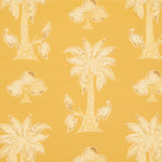 Detail of fabric in a playful palm tree print in tan and white on a yellow field.