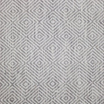 Broadloom carpet swatch in a geometric pattern in a slate grey design