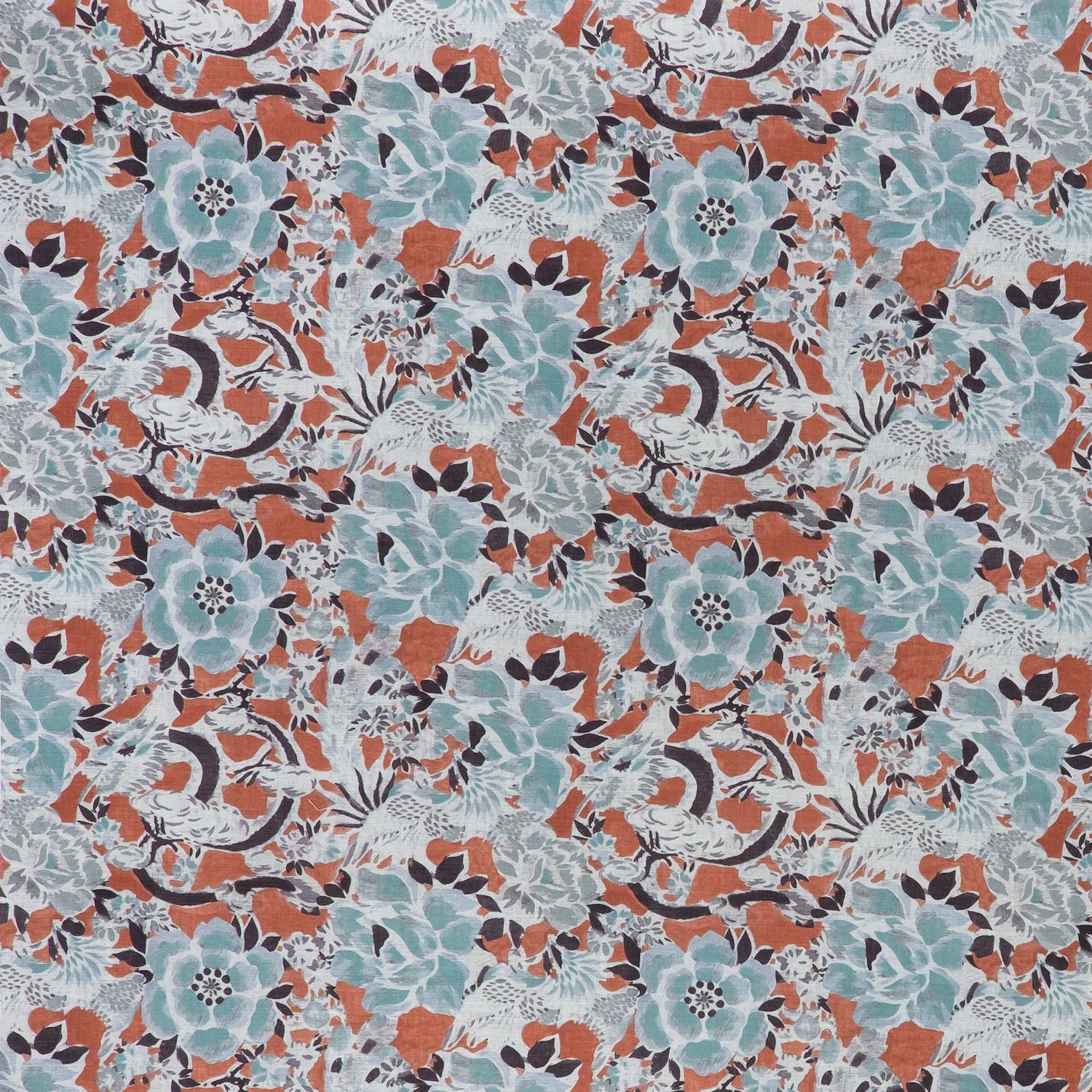 printed linen fabric in a painterly floral pattern in shades of blue and gray on a rust field.