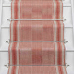 Striped flatweave runner in red on white staircase