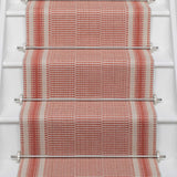 Striped flatweave runner in red on white staircase