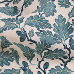 Textile with blue leaf pattern on a beige background