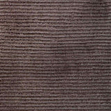 Close up of broadloom carpet with solid cut pile ribbed stripe in dark brown.