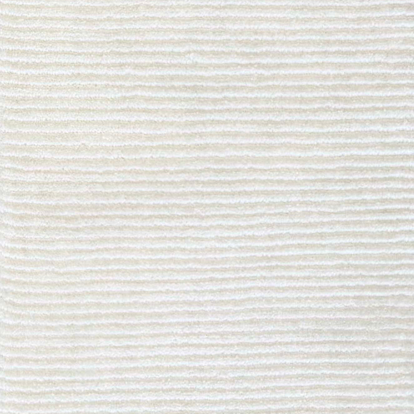 Close up of broadloom carpet with solid cut pile ribbed stripe in white 