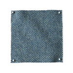 Pinned swatch of woven fabric in blue. 