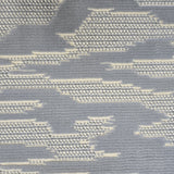 Broadloom carpet detail in an abstract cloud design in ivory and chambray blue.