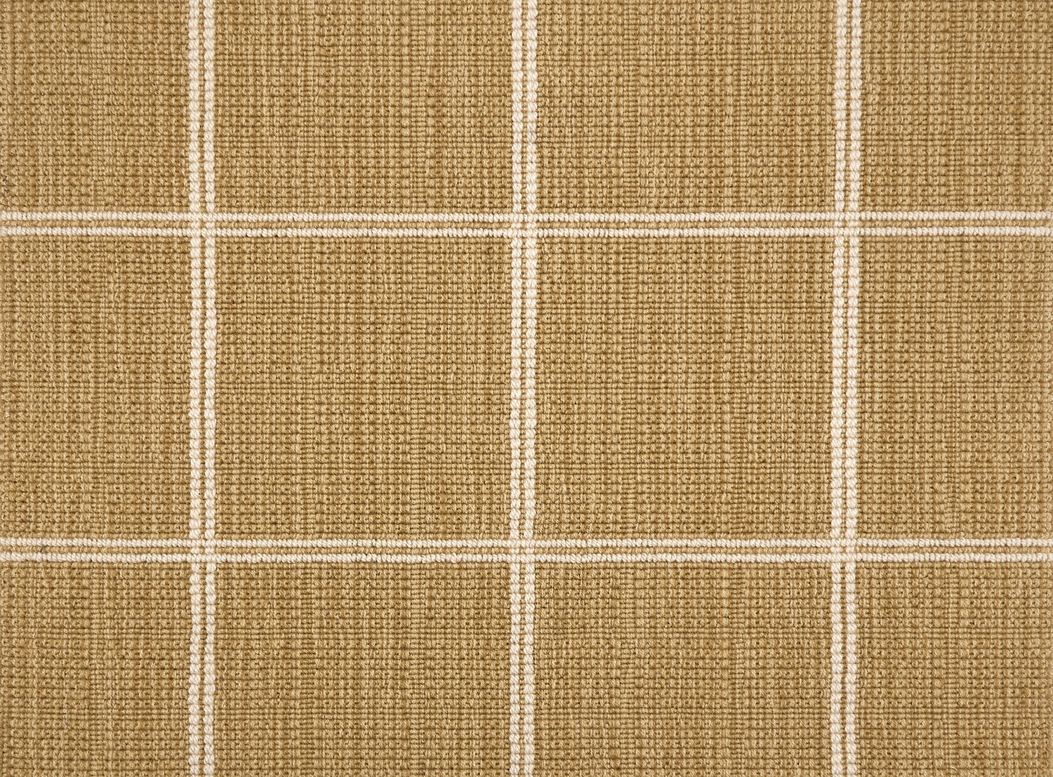 Broadloom carpet sample with windowpane grid in cream on a warm tan background. 