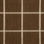 Broadloom carpet sample with windowpane grid in cream on a brown background. 