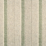 Textured broadloom carpet in ecru with stripes in green.