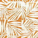 Detail of fabric in a botanical grid print in orange on a white field.
