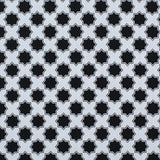 Moroccan star performance fabric in black and white. 