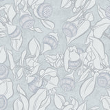 Patterned wallpaper with blooms and leaves on a light blue background