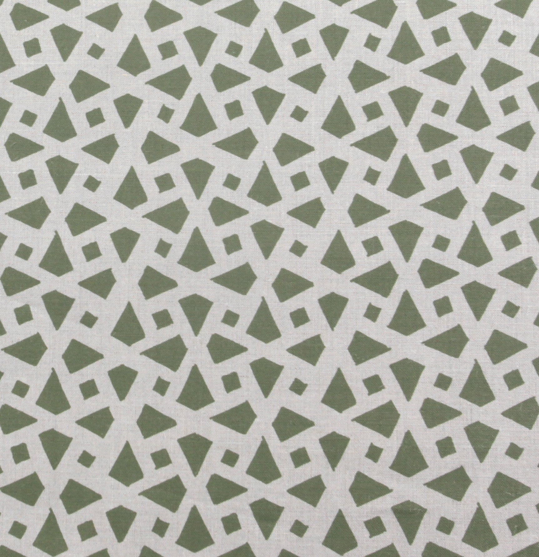 Detail of fabric in a geometric lattice print in sage on a greige field.