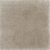 Close up of a handtufted rug in solid cut pile in taupe. 