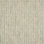 Broadloom carpet in a textural checkered pattern in ivory and light green. 