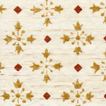 Detail of fabric in a botanical grid print in red and metallic gold on a cream field.