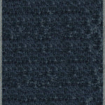 Handloomed rug with neutral border and raised cut pile shag field in midnight blue.