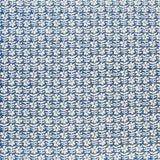 Detail of fabric in a floral grid print in white on a navy field.
