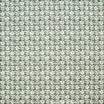 Detail of fabric in a floral grid print in white on a forest green field.