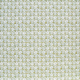 Detail of fabric in a floral grid print in white and blue on a mustard field.
