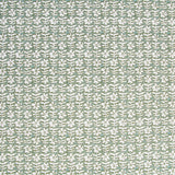 Detail of fabric in a floral grid print in white and sage on a light green field.