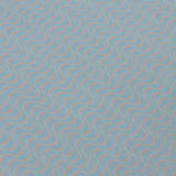 Detail of a wallpaper panel in an undulating stripe pattern in yellow and coral on a light blue field.