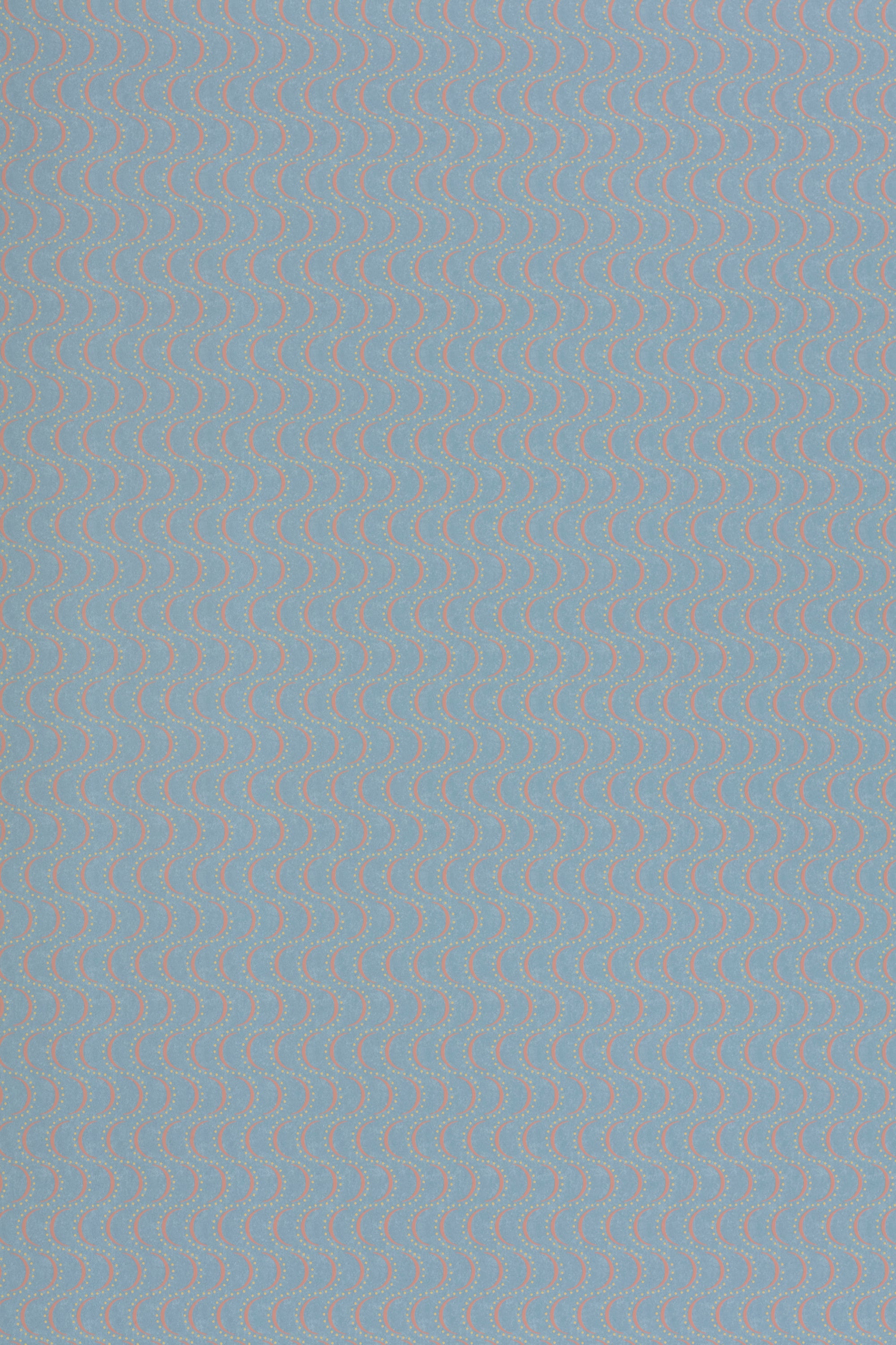 Wallpaper panel in an undulating stripe pattern in yellow and coral on a light blue field.