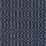 Wallpaper panel in an undulating stripe pattern in white and mustard on a dark navy field.