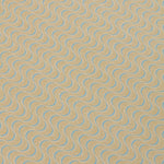 Detail of a wallpaper panel in an undulating stripe pattern in blue and white on a mustard field.