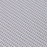 Detail of a wallpaper panel in a linear geometric print in shades of purple and navy on a light blue field.
