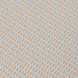 Detail of a wallpaper panel in a linear geometric print in shades of purple, blue and yellow on a light blue field.