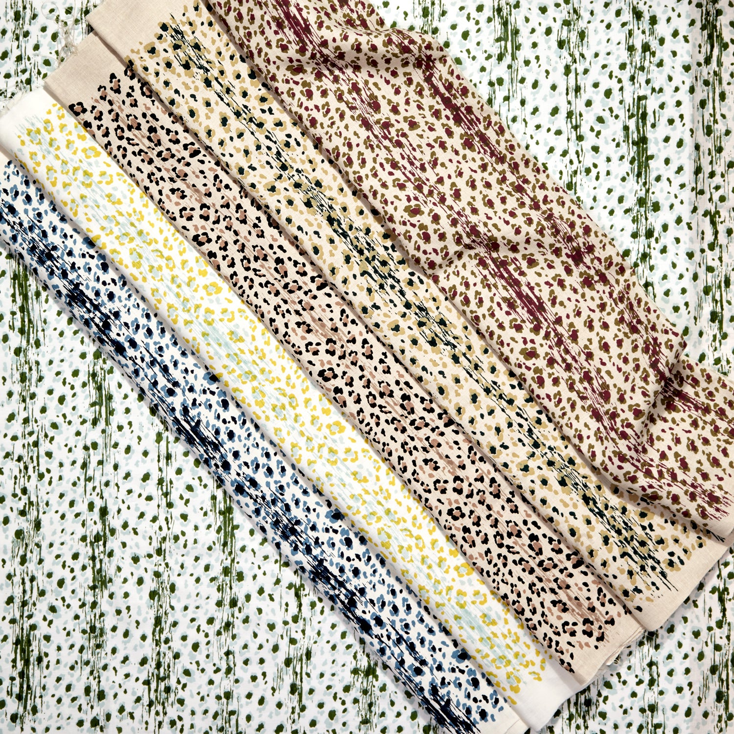 Gently draped fabric cuttings painterly animal print in various colors. 