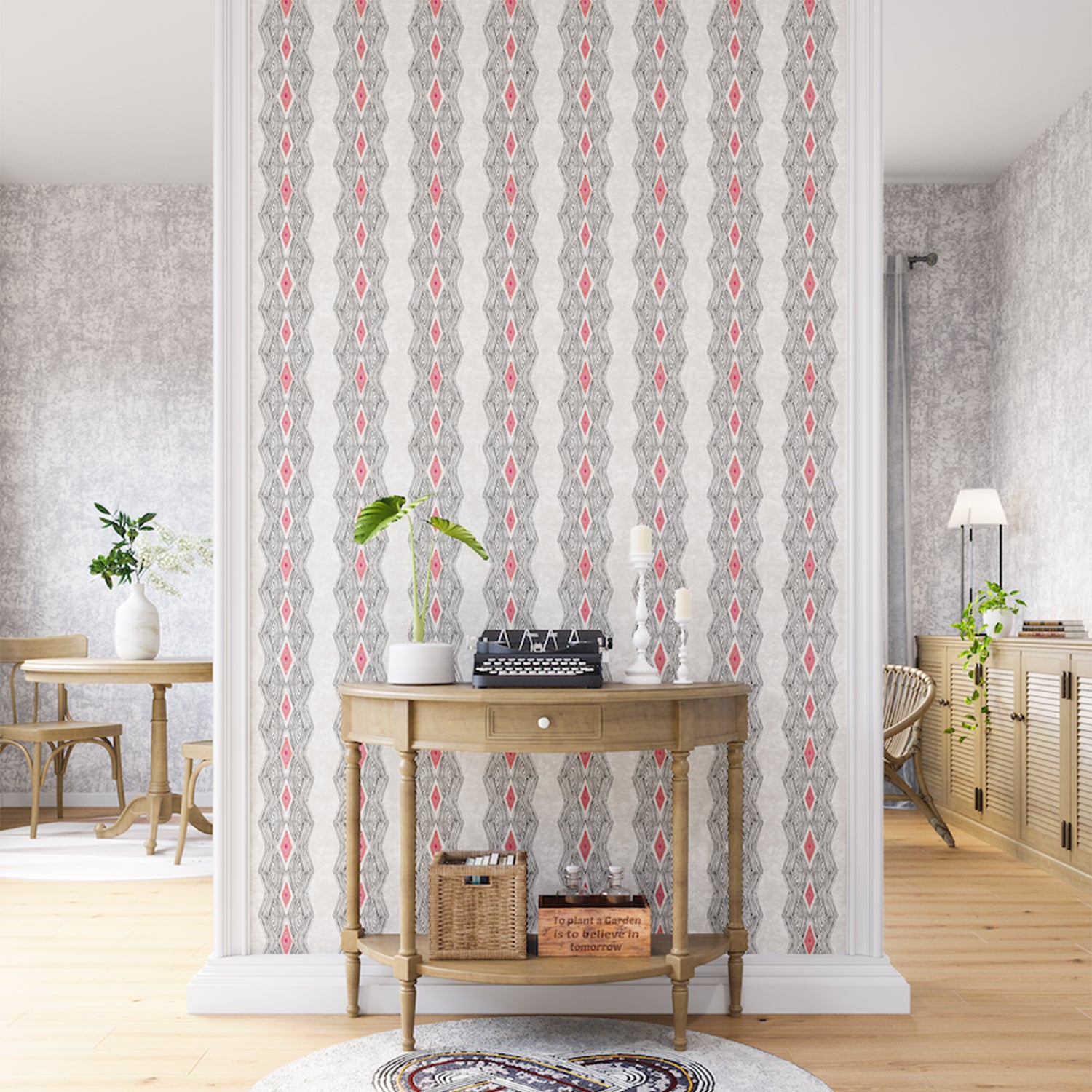 A maximalist living space with an accent wall papered in an intricate diamond stripe print in red, black and cream.