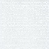 Detail of wallpaper in an abstract grid print in white.