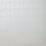 Detail of wallpaper in an abstract grid print in light gray.