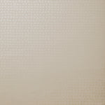 Detail of wallpaper in an abstract grid print in cream.