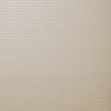 Detail of wallpaper in an abstract grid print in cream.